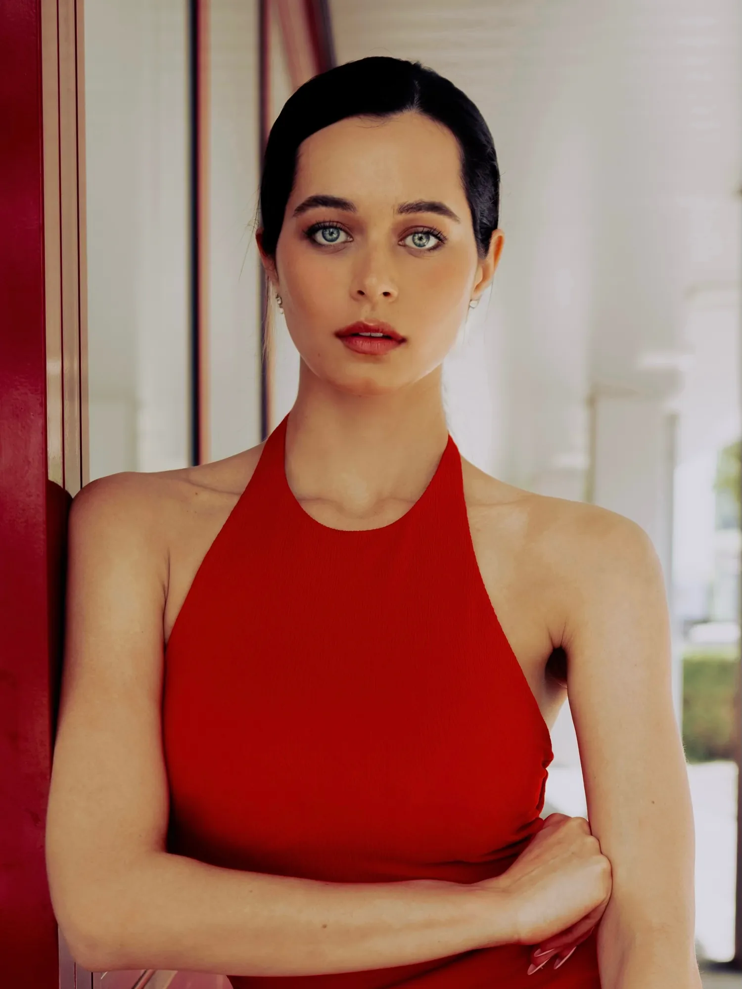 Itiya Dube in a red halter dress